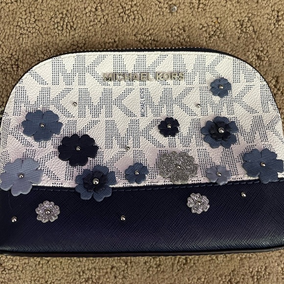 Michael Kors Floral make up case. - Picture 2 of 3